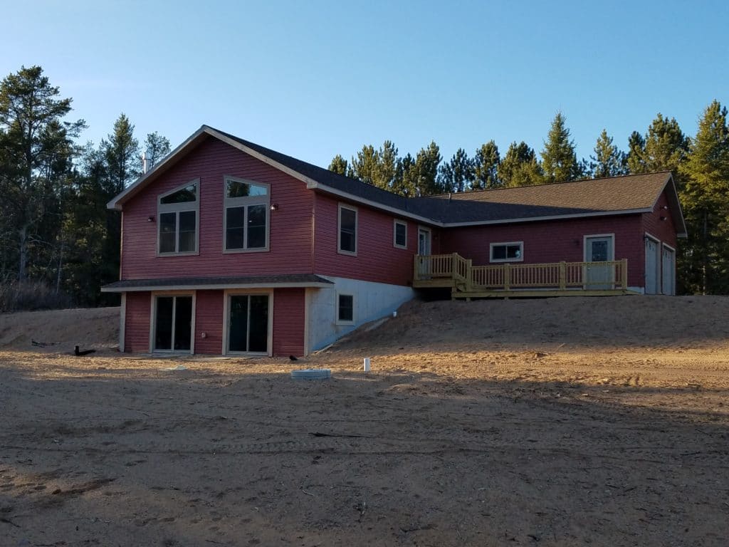 Home With Red Siding Scaled